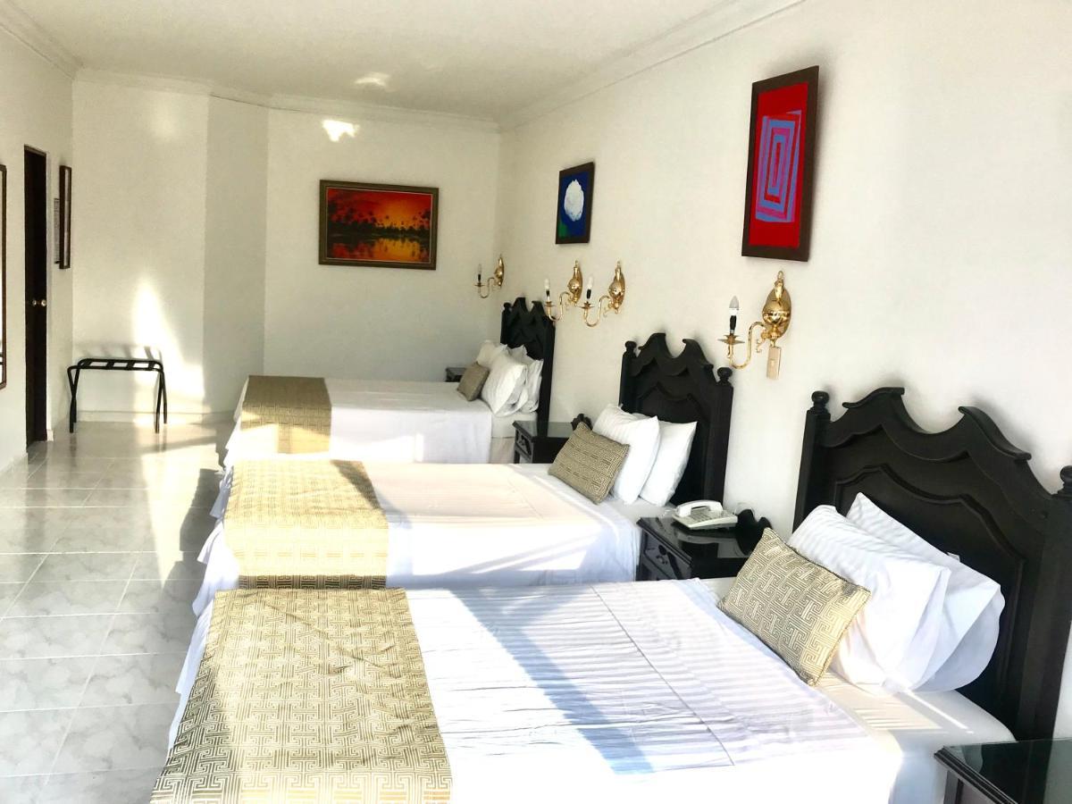 Casa Morales Hotel Internacional Y Centro De Convenciones 이바게 객실 사진