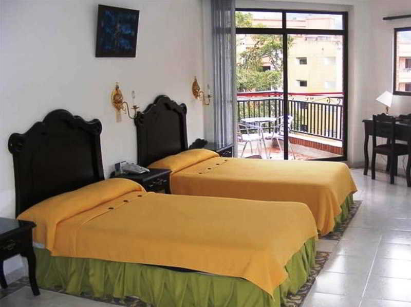 Casa Morales Hotel Internacional Y Centro De Convenciones 이바게 외부 사진