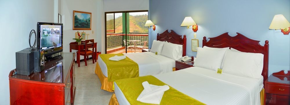 Casa Morales Hotel Internacional Y Centro De Convenciones 이바게 외부 사진